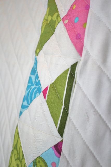 half square triangles with straight line quilting