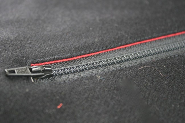 exposed enclosed zipper black