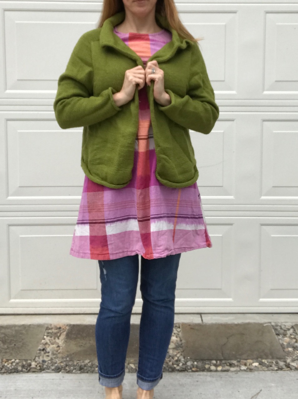 white puffer vest worn two ways with a sweater dress and slouchy sweater